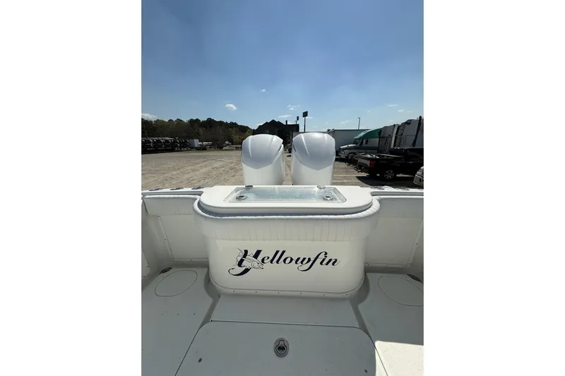 Cut Loose Yacht Photos Pics 2013 Yellowfin 32 Offshore boat with dual engines, parked outdoors under a clear sky.