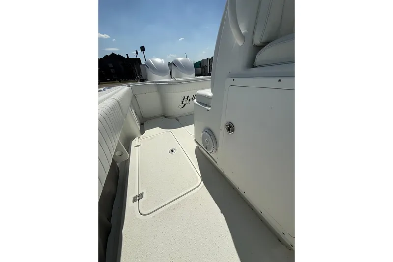 Cut Loose Yacht Photos Pics 2013 Yellowfin 32 Offshore boat interior with seating and storage compartments.