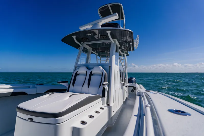  Yacht Photos Pics 2025 Yellowfin 36 Offshore boat on open sea under clear blue sky.