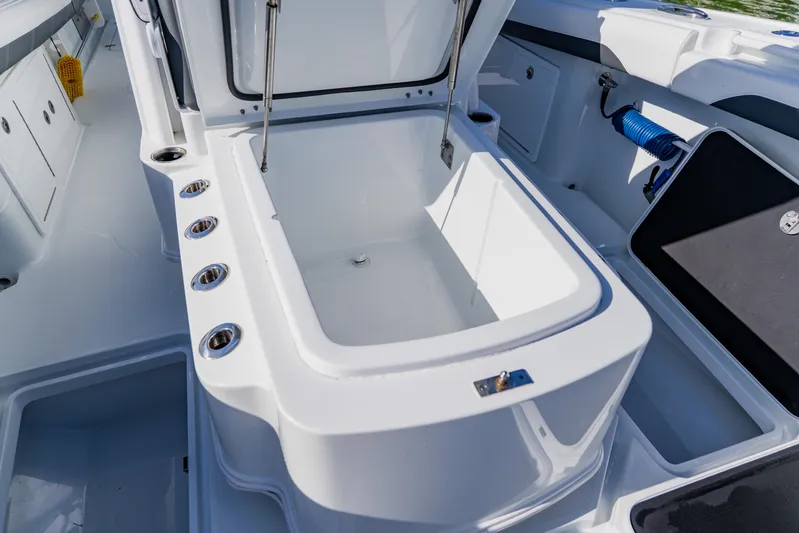  Yacht Photos Pics Open storage compartment on 2025 Yellowfin 36 Offshore boat deck.