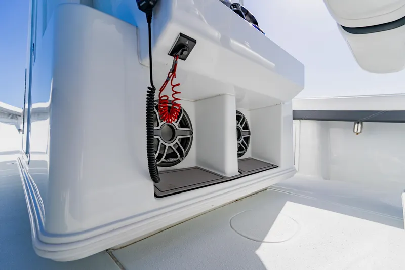  Yacht Photos Pics 2025 Yellowfin 36 Offshore boat interior with speakers and control panel.