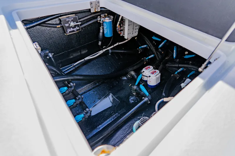 Yacht Photos Pics 2025 Yellowfin 36 Offshore boat interior showing wiring and plumbing components.