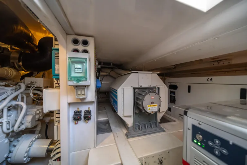 Jobsite Yacht Photos Pics Engine room of a 2009 Bertram 630 yacht with various mechanical components.