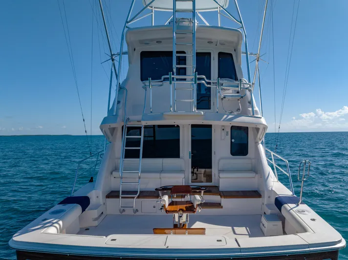 Jobsite Yacht Photos Pics Rear view of 2009 Bertram 630 yacht on open water.