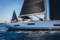 2022 Solaris 64 RS yacht sailing on open water with crew onboard.