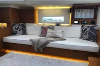 Luxurious interior of 2022 Solaris 64 RS yacht with elegant seating and ambient lighting.