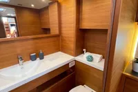 Luxurious wooden bathroom interior on a 2022 Solaris 64 RS yacht.