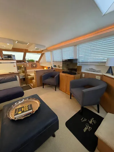 Lady Grace Yacht Photos Pics Interior of 1995 Hatteras 52 Motor Yacht with cozy seating and modern amenities.