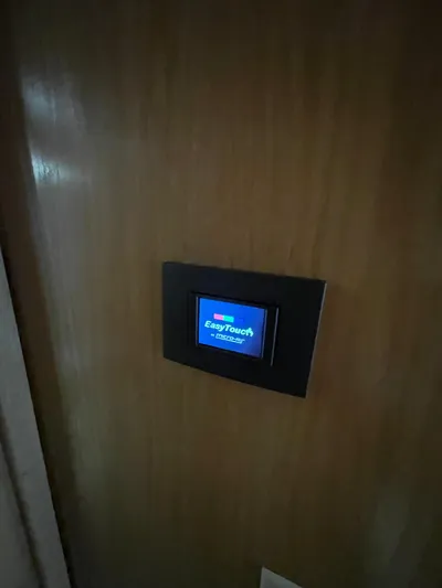 Lady Grace Yacht Photos Pics EasyTouch control panel on 1995 Hatteras 52 Motor Yacht interior wall.