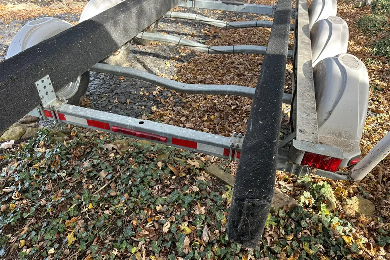  Yacht Photos Pics Boat trailer for 2017 Sea Ray 280 SLX, surrounded by autumn leaves.