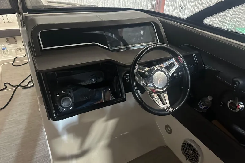  Yacht Photos Pics 2017 Sea Ray 280 SLX boat dashboard with steering wheel and control panel.