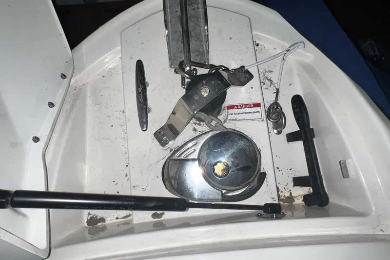  Yacht Photos Pics 2017 Sea Ray 280 SLX boat anchor compartment with mechanical components and warning label.