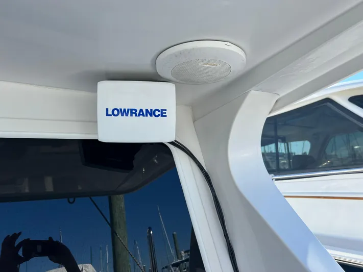 Dog Daze Yacht Photos Pics Lowrance device installed on a 2001 Jupiter 35 Convertible boat interior.