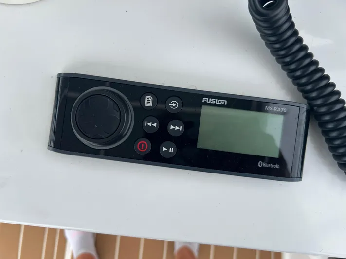 Dog Daze Yacht Photos Pics Fusion MS-RA70 Bluetooth marine stereo on Jupiter 35 Convertible, 2001 model.