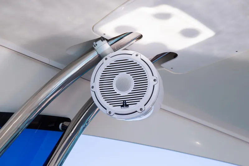 Yacht Photos Pics Speaker on 2018 Prestige 560 Flybridge yacht, mounted on a sleek metal frame.