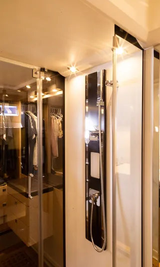  Yacht Photos Pics Luxurious bathroom interior of 2018 Prestige 560 Flybridge yacht with modern shower design.