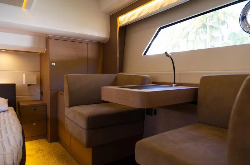  Yacht Photos Pics Luxurious interior of 2018 Prestige 560 Flybridge yacht with elegant seating and modern design.