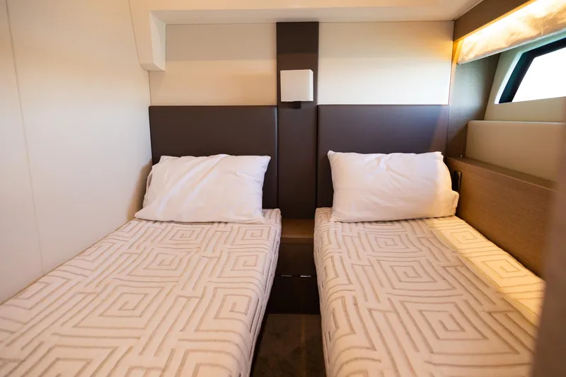  Yacht Photos Pics Twin beds in 2018 Prestige 560 Flybridge yacht cabin, modern design and cozy ambiance.