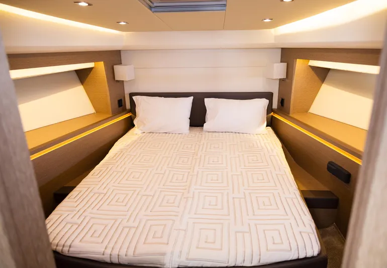  Yacht Photos Pics Luxurious bedroom interior of 2018 Prestige 560 Flybridge yacht with modern design.
