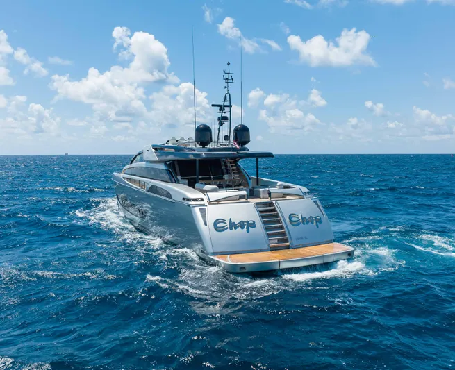 Chop Chop Yacht Photos Pics Luxurious 2014 Riva Mythos Motoryacht cruising on open blue sea under clear skies.