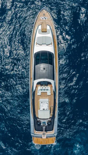 Chop Chop Yacht Photos Pics Aerial view of 2014 Riva Mythos Motoryacht cruising on deep blue ocean waters.
