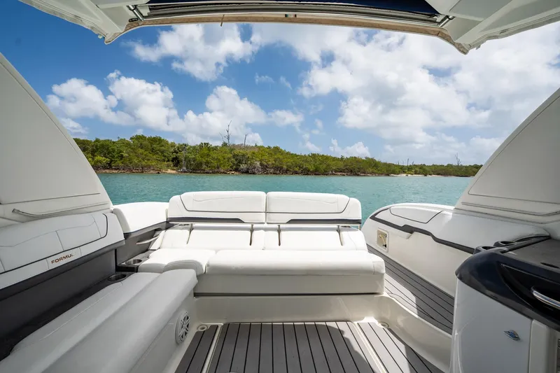Remarkable III Yacht Photos Pics 2019 Formula 350 Crossover Bowrider OB, luxurious seating, scenic water view, clear skies.