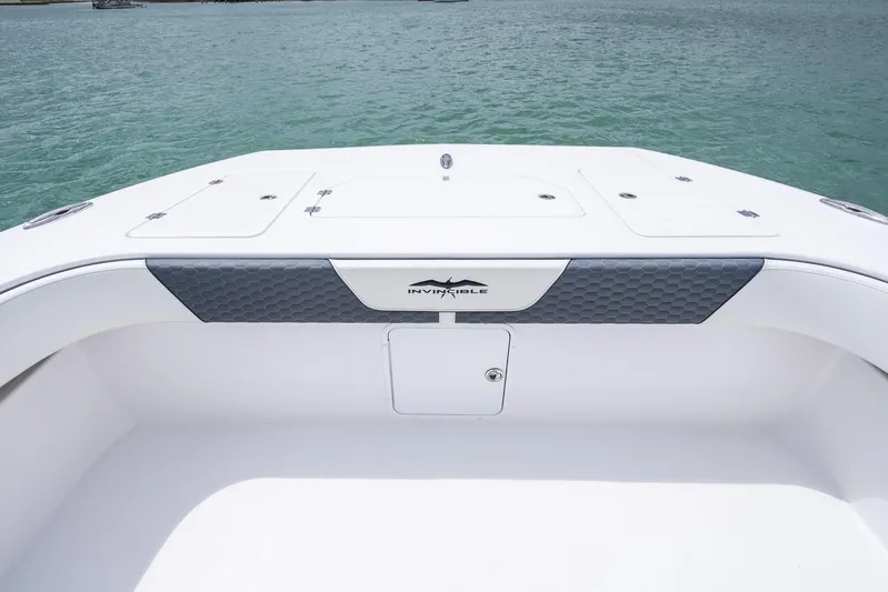 Kroppdustr Yacht Photos Pics 2023 Invincible 37 Catamaran deck, featuring sleek design and spacious layout on calm waters.