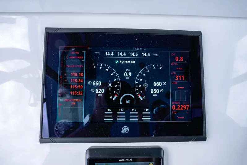 Kroppdustr Yacht Photos Pics 2023 Invincible 37 Catamaran dashboard display showing engine metrics and navigation data.