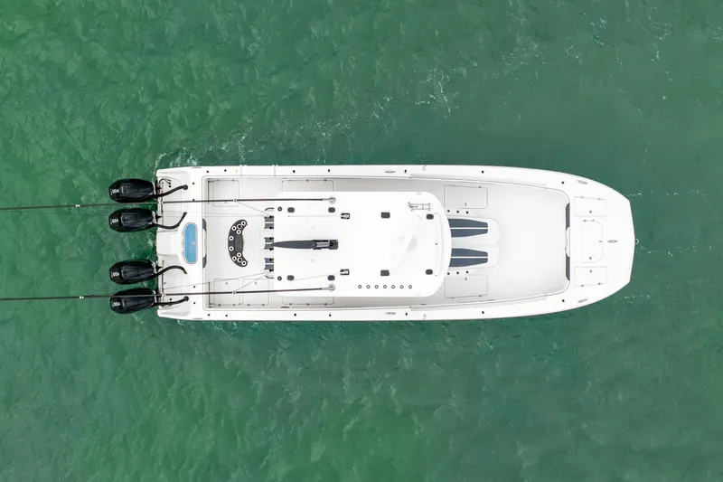 Kroppdustr Yacht Photos Pics Aerial view of 2023 Invincible 37 Catamaran on turquoise water.