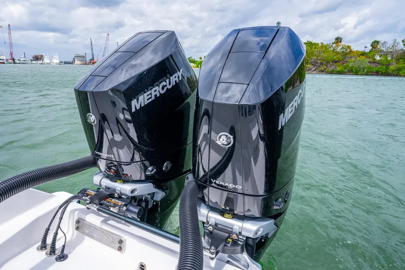 Kroppdustr Yacht Photos Pics Twin Mercury Verado engines on 2023 Invincible 37 Catamaran in scenic waters.