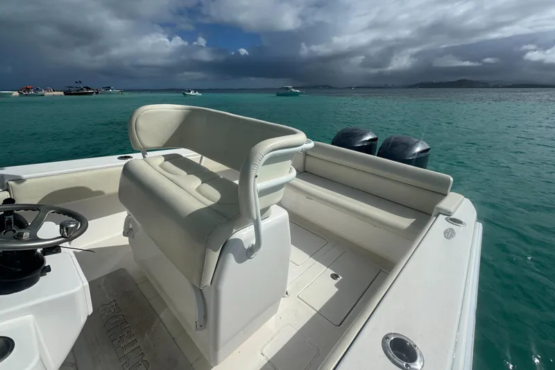  Yacht Photos Pics 2013 Contender 30 ST boat with dual engines on turquoise water.