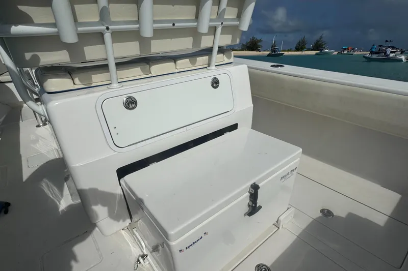  Yacht Photos Pics 2013 Contender 30 ST boat interior with storage compartments and seating.