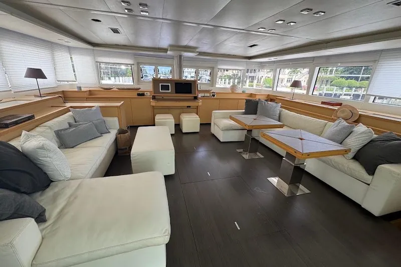 London Sky Yacht Photos Pics Luxurious interior of 2015 Lagoon Motor Yacht with modern seating and elegant decor.