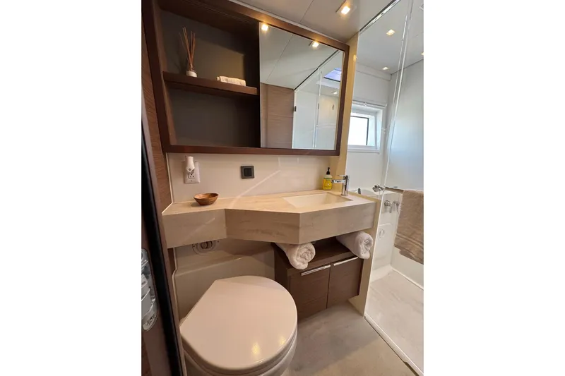  Yacht Photos Pics Modern bathroom in 2020 Lagoon 46 yacht with sleek sink and storage.