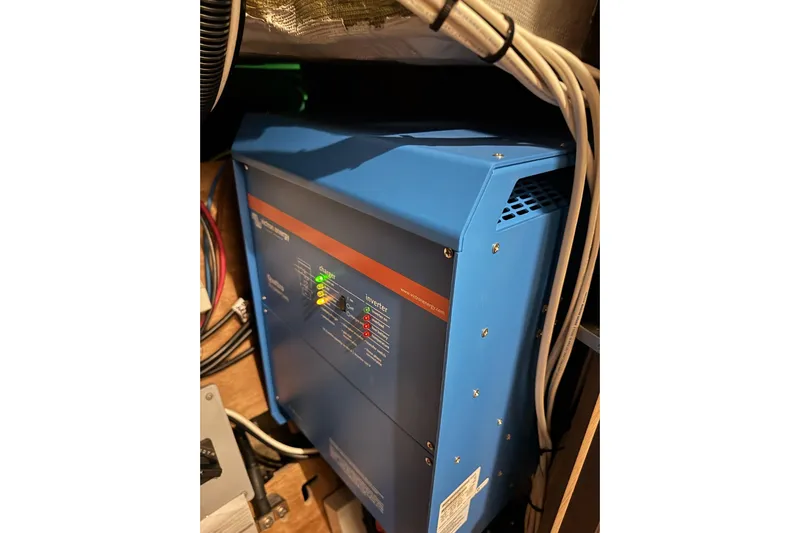  Yacht Photos Pics Electrical system in 2020 Lagoon 46 yacht, featuring a blue inverter with visible wiring.