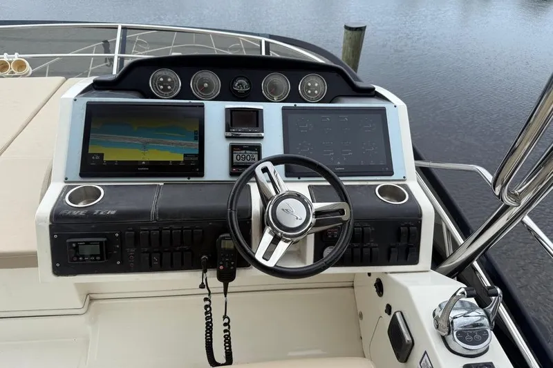 Caroline Kai Yacht Photos Pics Helm of 2016 Sea Ray 510 Fly yacht with dual displays and controls.