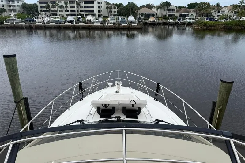 Caroline Kai Yacht Photos Pics 2016 Sea Ray 510 Fly yacht docked in a marina with waterfront view.