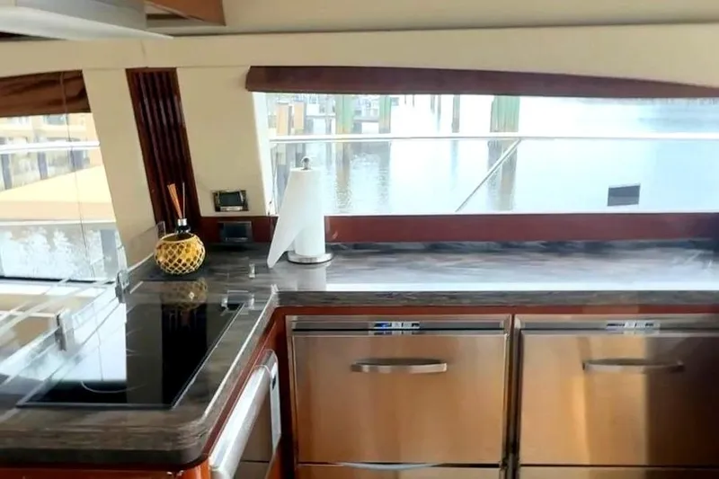 Caroline Kai Yacht Photos Pics Luxurious 2016 Sea Ray 510 Fly yacht kitchen with modern appliances and sleek design.