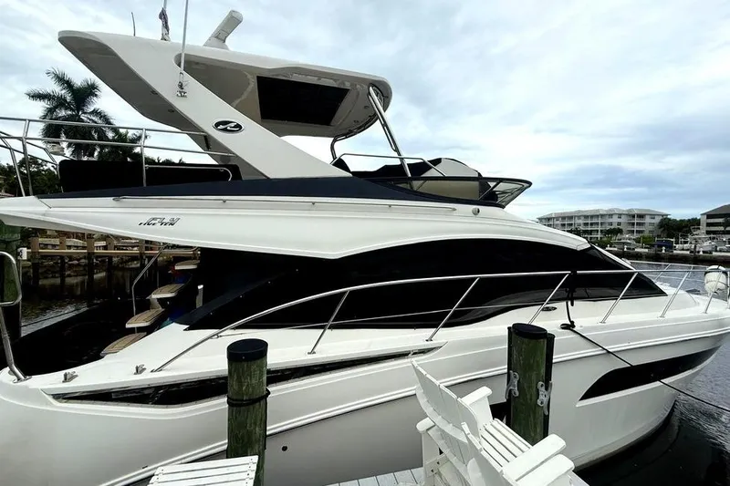 Caroline Kai Yacht Photos Pics 2016 Sea Ray 510 Fly yacht docked at marina, featuring sleek design and modern amenities.