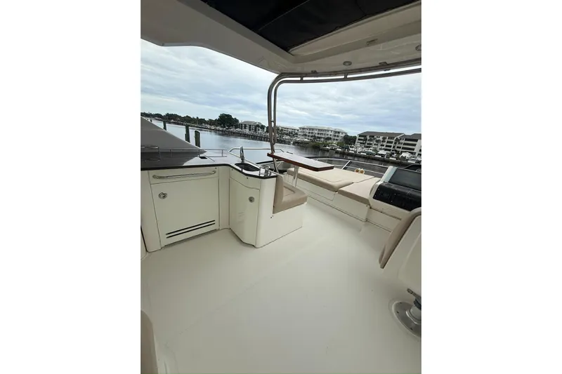 Caroline Kai Yacht Photos Pics Luxurious 2016 Sea Ray 510 Fly yacht interior with waterfront view.