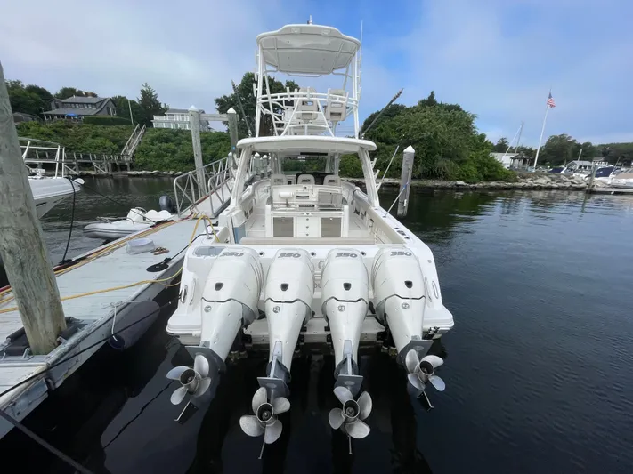  Yacht Photos Pics 2017 Boston Whaler 420 Outrage with four engines docked at marina.