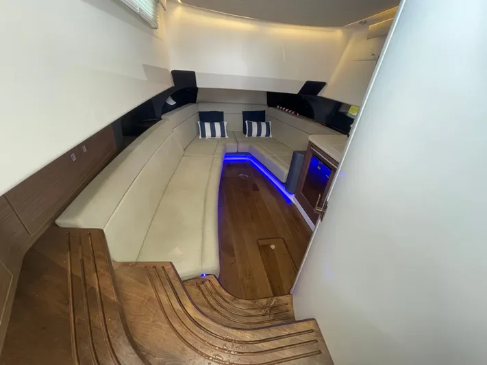  Yacht Photos Pics Luxurious interior of 2017 Boston Whaler 420 Outrage with elegant seating and ambient lighting.