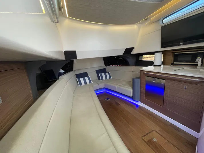  Yacht Photos Pics Luxurious interior of 2017 Boston Whaler 420 Outrage with modern seating and ambient lighting.