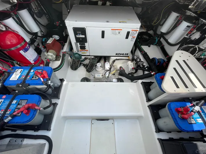  Yacht Photos Pics Engine room of 2017 Boston Whaler 420 Outrage with Kohler generator and batteries.