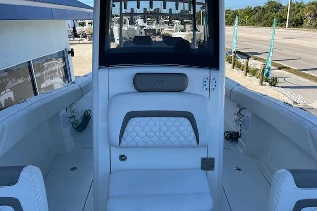  Yacht Photos Pics 2020 World Cat 280 CC-X boat interior with white seating and modern design.