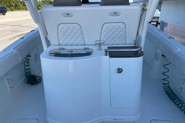  Yacht Photos Pics 2020 World Cat 280 CC-X boat interior with seating and storage compartments.