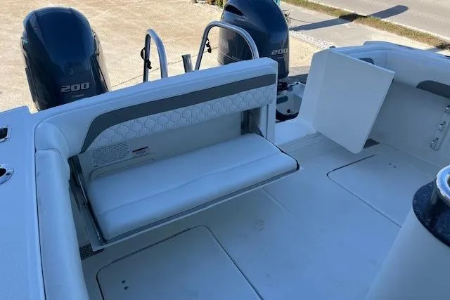  Yacht Photos Pics 2020 World Cat 280 CC-X boat interior with seating and dual engines.