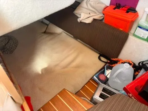 Seahorse Yacht Photos Pics Interior cabin of 2016 Cutwater 28 LE boat with storage items and seating area.