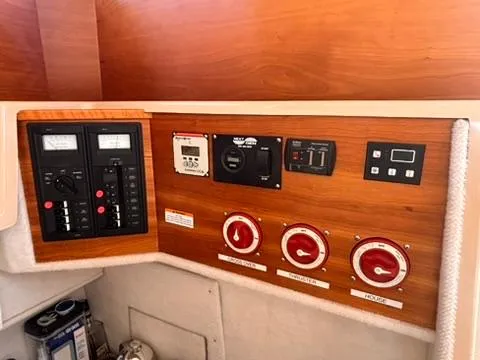 Seahorse Yacht Photos Pics Control panel of a 2016 Cutwater 28 LE boat with various switches and gauges.