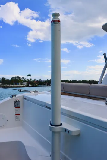  Yacht Photos Pics 2017 Pursuit DC 295 Dual Console boat interior with clear sky and water view.